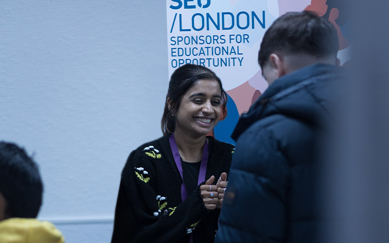 An activation in the retail area with students