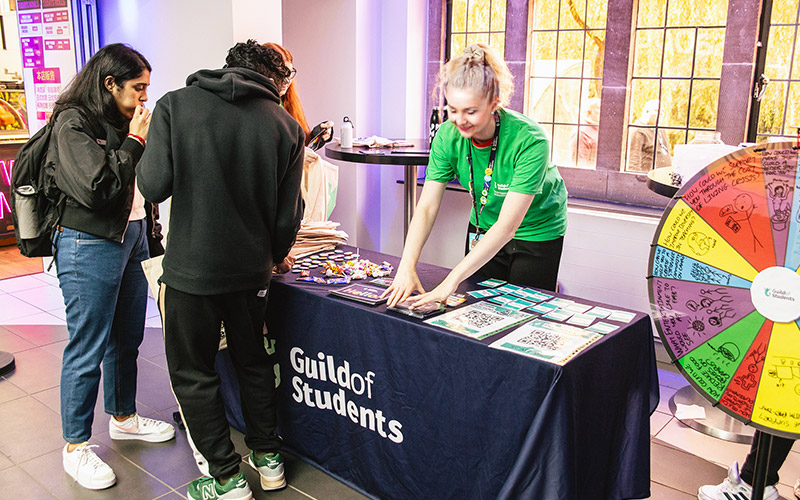 An activation in the retail area with students