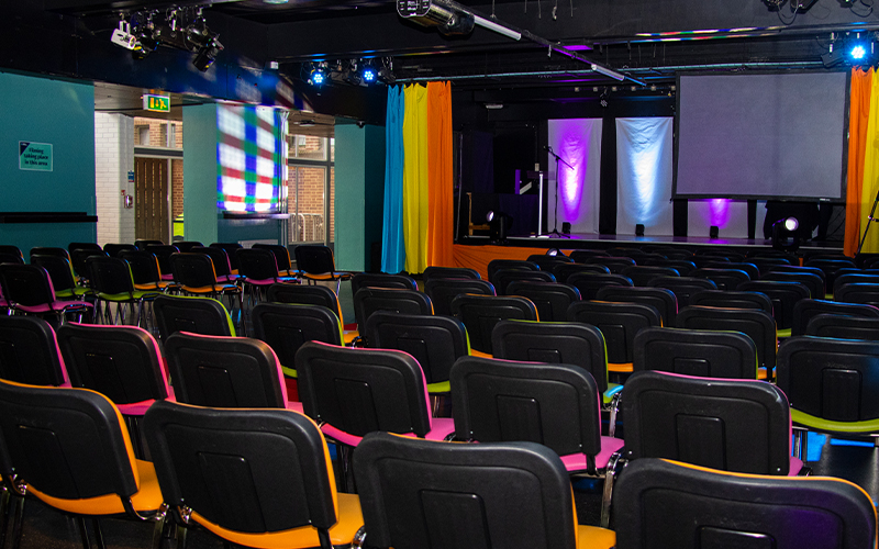 A photo of the Underground set up with rows of chairs