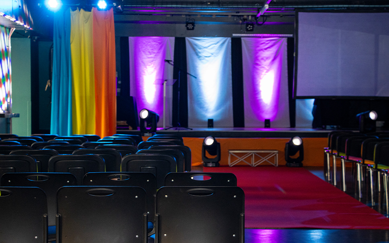 A photo of the Underground set up with rows of chairs