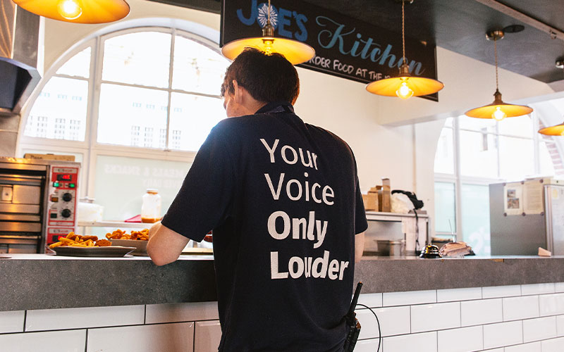 a photo of a student staff member working in joes bar kitchen