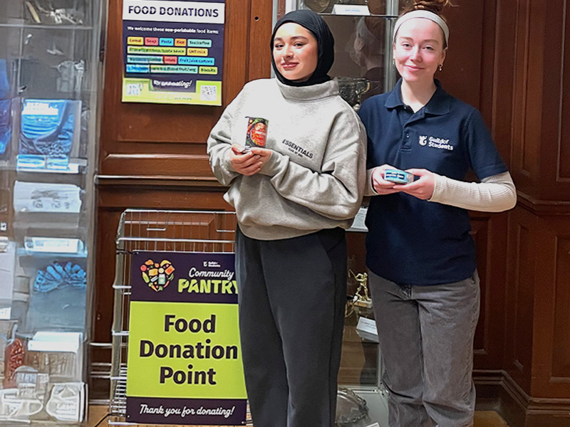 an image of students stood next to a drop off