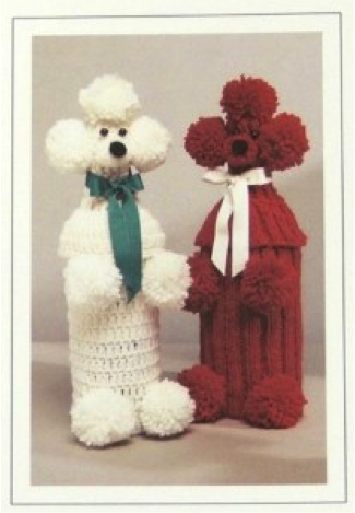two puddle hot water bottles. Left one white and the right one red.